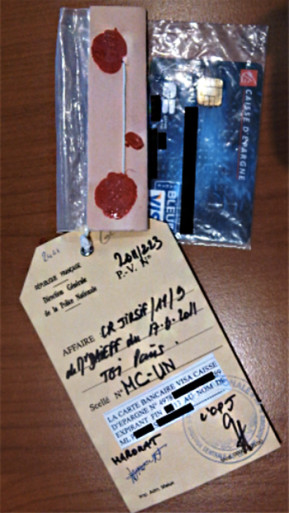 An image from the ENS and CEA researchers’ paper shows one of the counterfeit credit cards in an evidence bag.